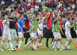 Slovenskí futbalisti sa tešia z víťazstva po zápase E-skupiny Belgicko - Slovensko.